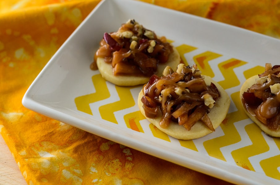 Caramel Apple Shortbread Bruschetta | Bruschetta for dessert! A soft, melt-in-your-mouth shortbread "crostini", smeared with caramel cream cheese and topped with a nutty caramel apple crown.