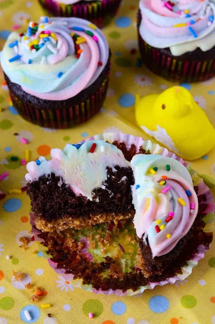 PEEPS® Surprise S'mores Cupcakes | These sweet little chocolate & graham cracker cupcakes contain a secret surprise - they're filled & iced with PEEPS®! 