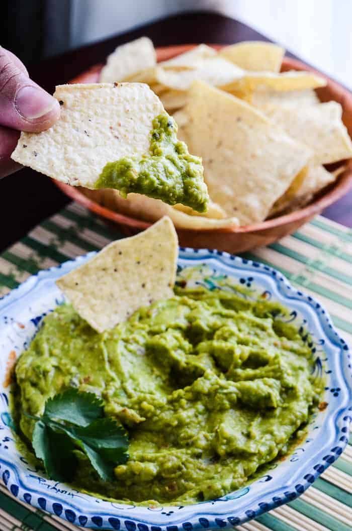 Vegetables and spices are blended over heat before adding avocado, giving this guacamole a velvety smooth, yet chunky texture that's perfect for dipping!