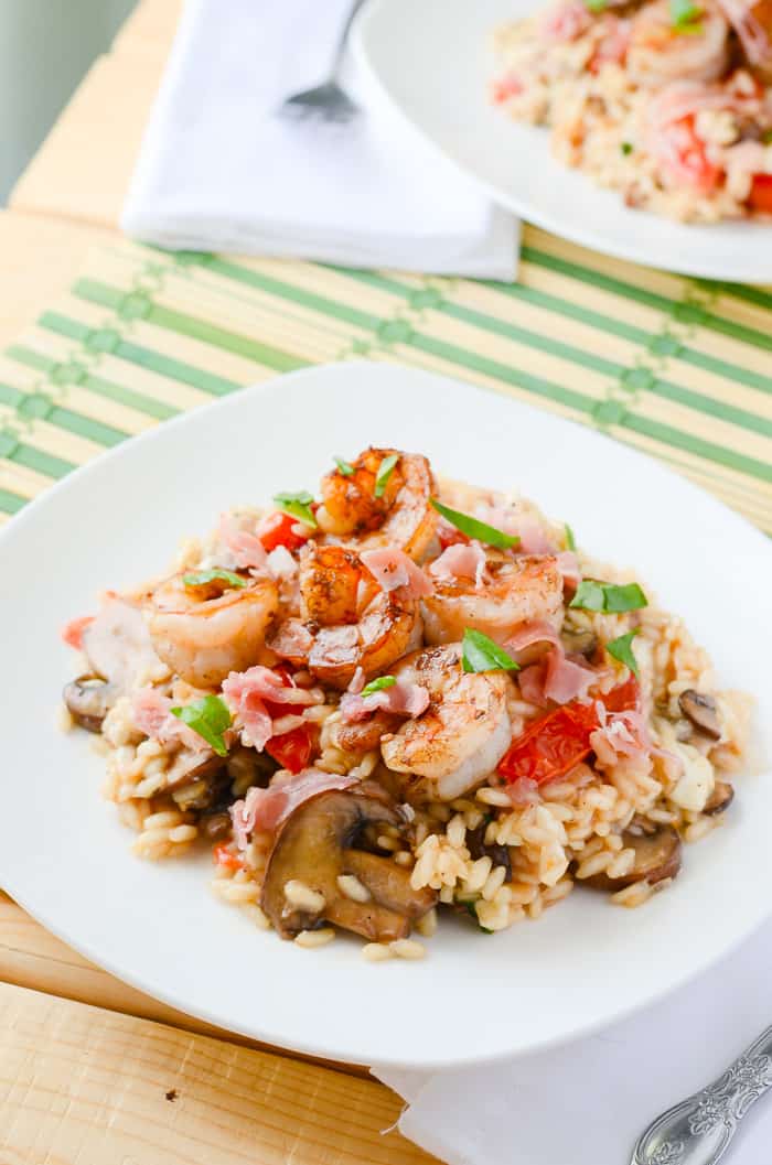 Mushroom Caprese Risotto with Balsamic Shrimp | A traditional side dish is the star of the dinner table in this simple meal, bringing together the classic flavors of caprese, prosciutto, and shrimp in a creamy, white wine risotto. 
