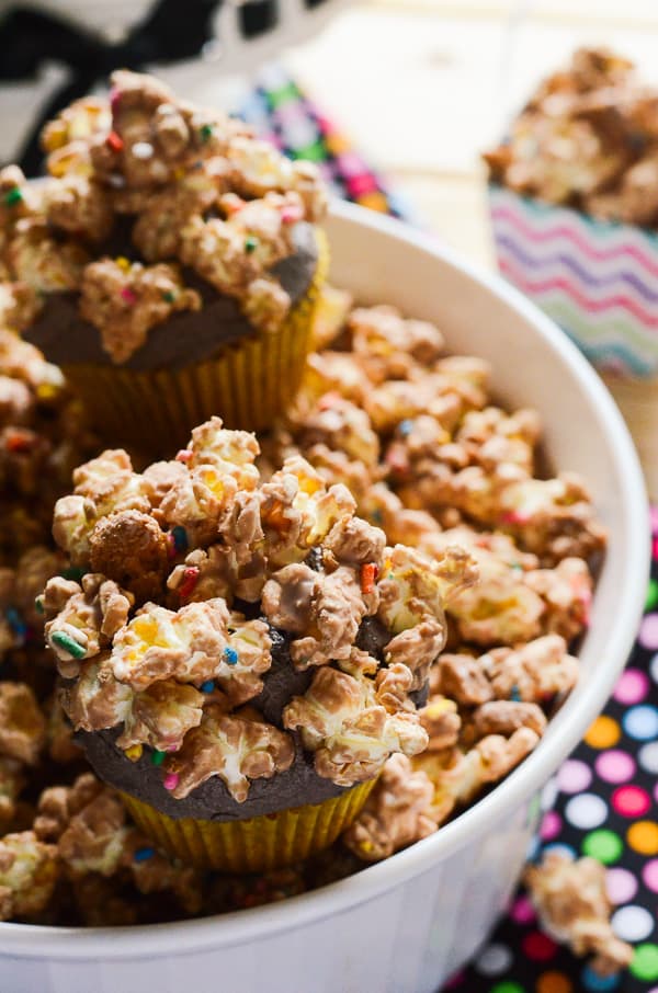 Cookie Butter Popcorn Cupcakes | The simplicity of cupcakes + the intrigue of cookie butter + the whimsy of popcorn = one unique and tasty dessert that's perfect for any celebration!