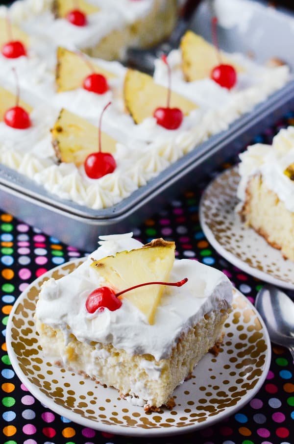 Pina Colada Tres Leches Cake | Now you can have your cake and drink it, too! Adding the flavors of a favorite fruity cocktail puts an even more tropical twist on an already luscious dessert!