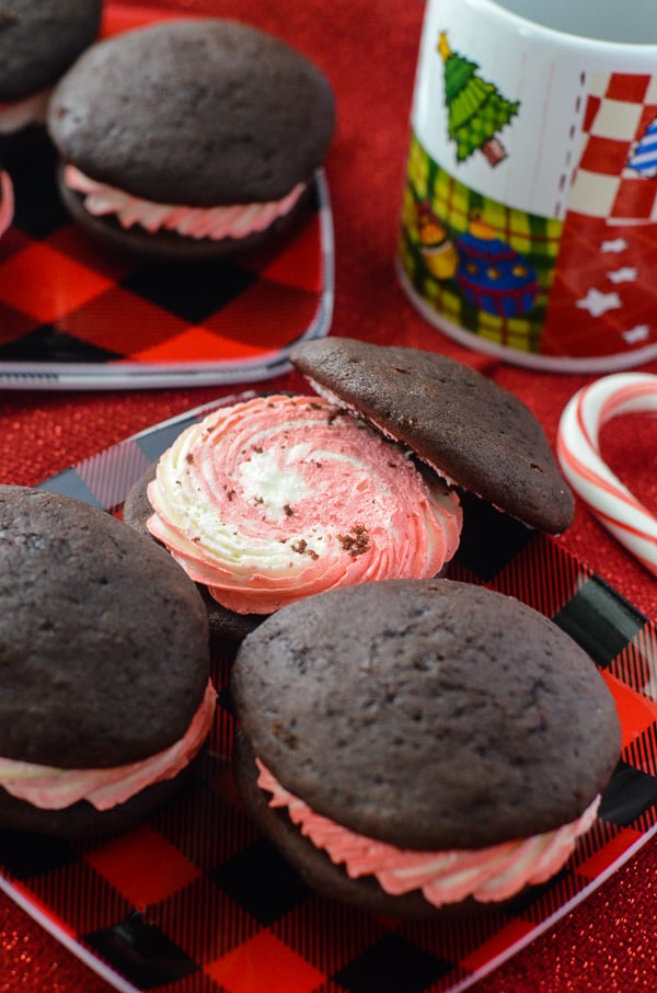 Peppermint Swirl Whoopie Pies | A cool & refreshing winter spin on a traditional Amish cookie, these puffy, cake-like treats are the perfect blend of chocolate and peppermint.