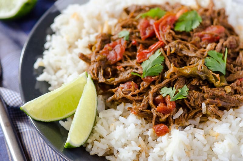 Ropa Vieja | Spanish for 'old clothes' thanks to its shredded appearance, this flavorful Cuban dish is made with lean beef and makes for a healthy Sunday Supper.