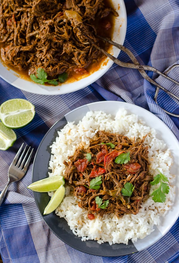 Ropa Vieja | Spanish for 'old clothes' thanks to its shredded appearance, this flavorful Cuban dish is made with lean beef and makes for a healthy Sunday Supper.