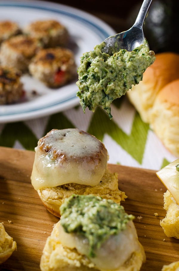 Spicy-Tuna Croquette Sliders | Two appetizers in one! Spicy tuna croquettes transformed into fun mini sliders, topped with melty cheese and homemade avocado pesto.