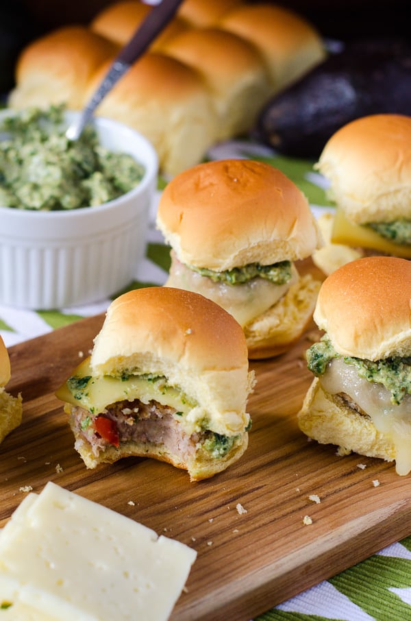 Spicy-Tuna Croquette Sliders | Two appetizers in one! Spicy tuna croquettes transformed into fun mini sliders, topped with melty cheese and homemade avocado pesto.