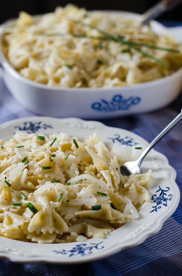 Polish Haluski | Pan fried farfalle pasta, butter-caramelized onions, and tangy sauerkraut are all you need to relax and satisfy your soul in this delicious eastern European comfort food.