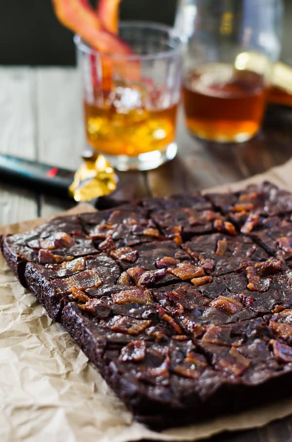 Black Bourbon Walnut Brownies with Maple-Candied Bacon | Dark chocolate, walnuts, and bourbon whiskey come together with maple-candied bacon to create the manliest, most decadent batch of brownies you'll ever eat! They're perfect for the men in your life with both a killer sweet tooth and a fine palate!