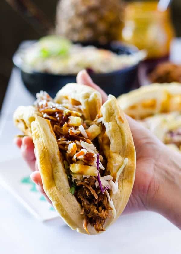 Watch your back, tortillas - stuffed with slow cooked BBQ pulled pork and pineapple coleslaw, these Pulled Pork Waffle Tacos are coming to take Tuesdays away from you! 