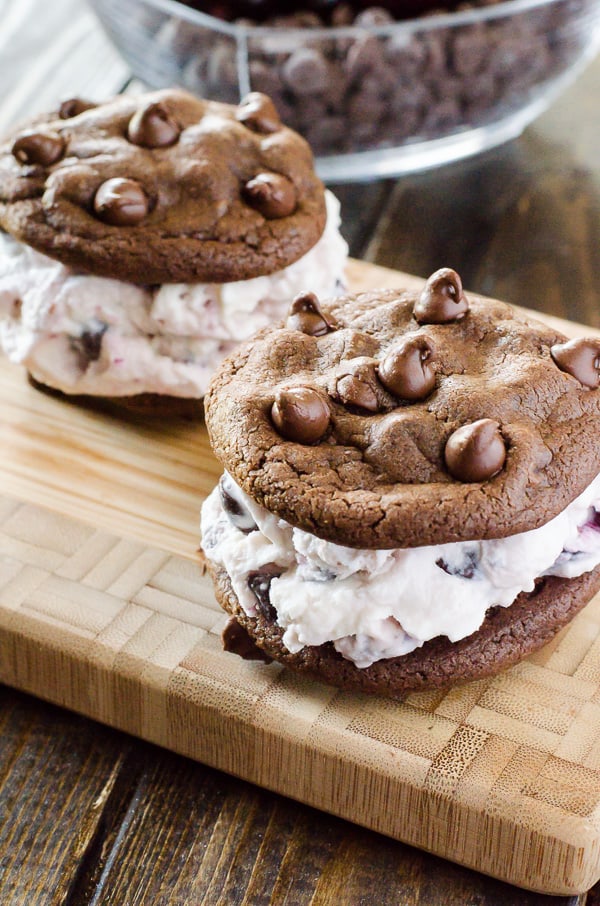 Dying for a cold treat but can't keep them in the house? Whip up these Black Forest Ice Cream Sandwiches for Two and calm your craving! Small batch homemade black forest ice cream sandwiched between two double chocolate chip cookies - summer doesn't get much yummier than this!