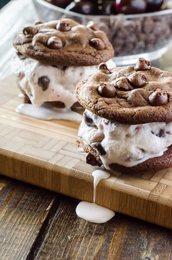 Dying for a cold treat but can't keep them in the house? Whip up these Black Forest Ice Cream Sandwiches for Two and calm your craving! Small batch homemade black forest ice cream sandwiched between two double chocolate chip cookies - summer doesn't get much yummier than this!