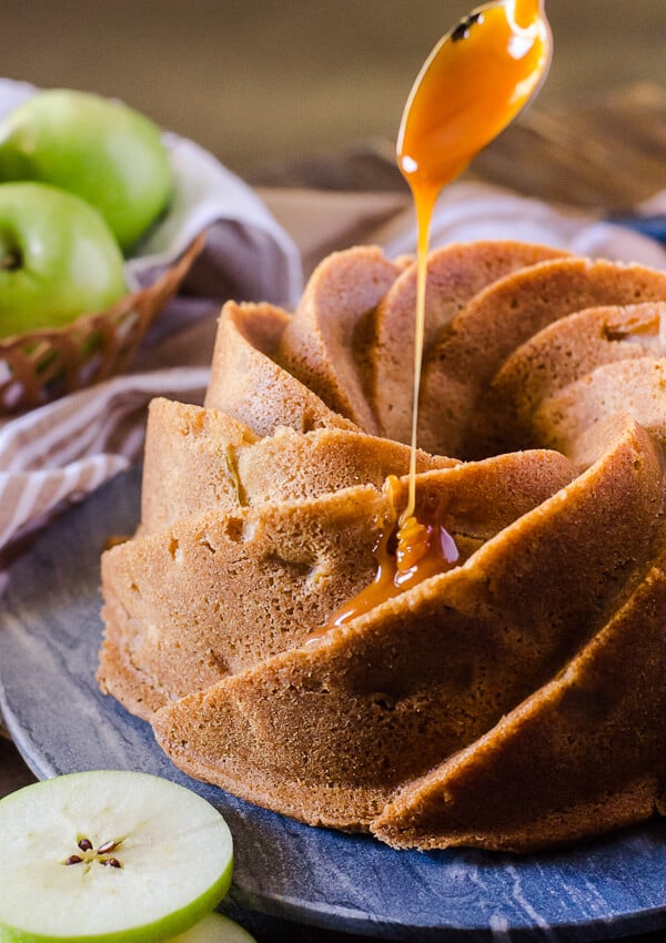 So much caramel! This Double Caramel Apple Bundt Cake isn't just boasting - moist caramel cake, loaded with apples and a little spice, then doused in even more caramel sauce for a deliciously sweet dessert experience!