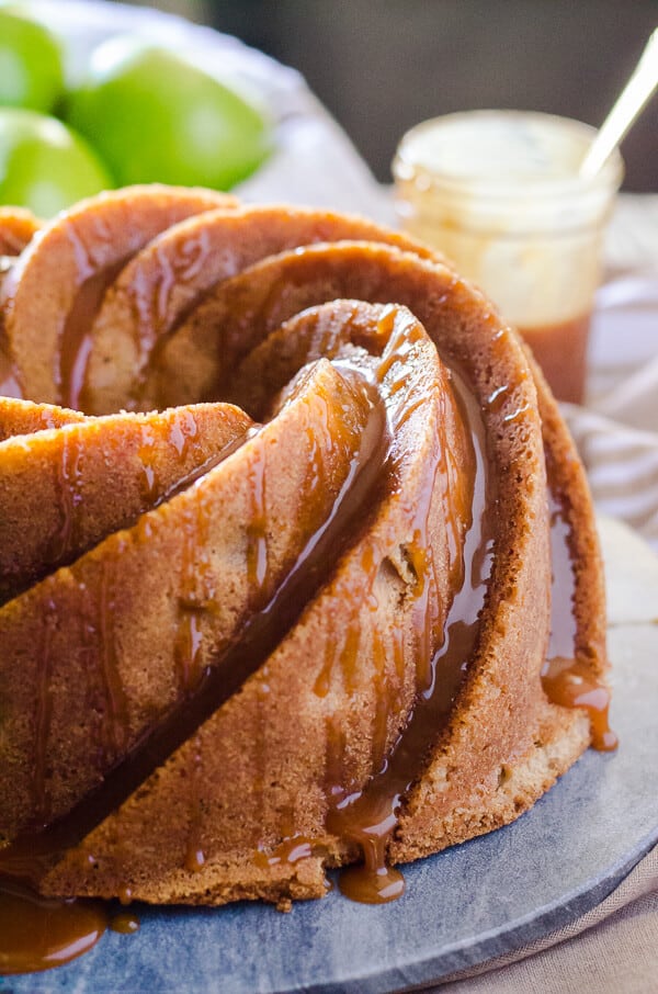So much caramel! This Double Caramel Apple Bundt Cake isn't just boasting - moist caramel cake, loaded with apples and a little spice, then doused in even more caramel sauce for a deliciously sweet dessert experience!