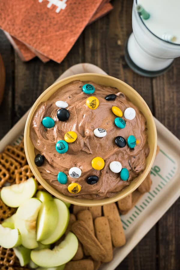 The easiest, most fun way to eat brownies! This Brownie Batter Dip is loaded with mini chocolate chips and M&Ms - any color will do, but bonus points if they're repping your favorite team! 