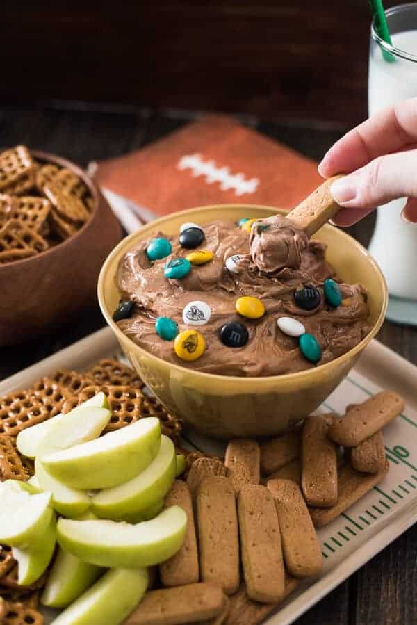 The easiest, most fun way to eat brownies! This Brownie Batter Dip is loaded with mini chocolate chips and M&Ms - any color will do, but bonus points if they're repping your favorite team! 