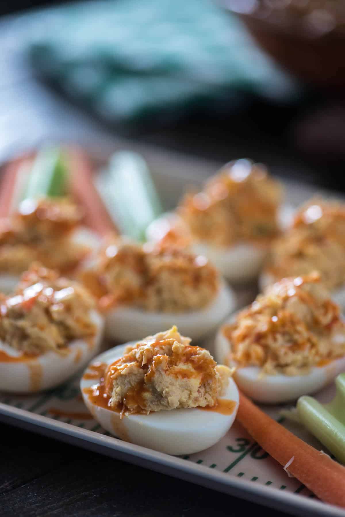 Can't decide between the chicken or the egg? Have both! These Buffalo Chicken Deviled Eggs are everything you love about big game appetizers, and so much more!