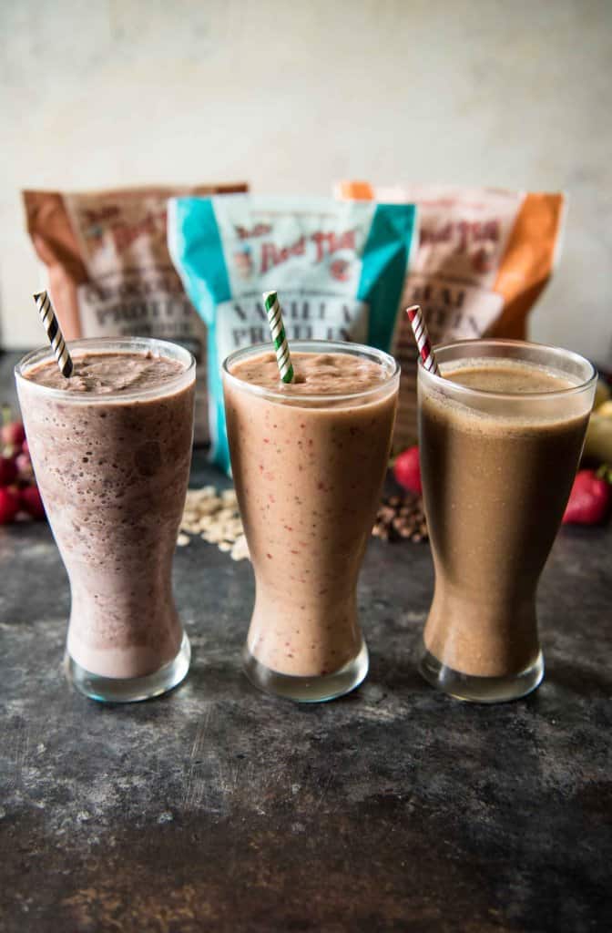 Start your day strong! These three very different protein breakfast smoothies recipes are all equally packed full of vitamins, minerals, fiber, & probiotics - but more importantly, they taste like dessert!