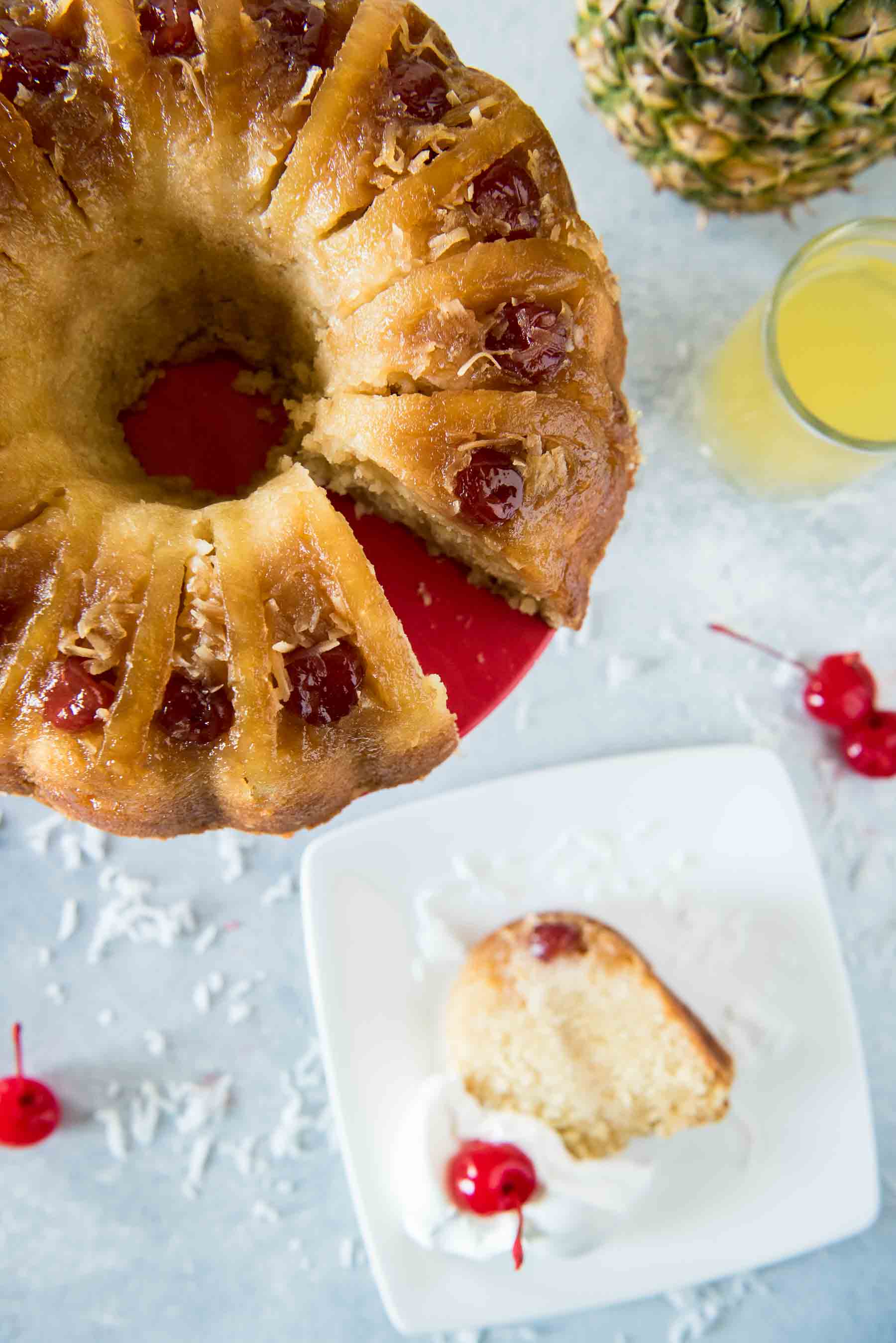 This Pina Colada Bundt Cake is unlike any you've had before! It takes the base of an old-fashioned soda-based cake and flips it on its head, turning it into a moist, tropical cocktail-flavored confection! 