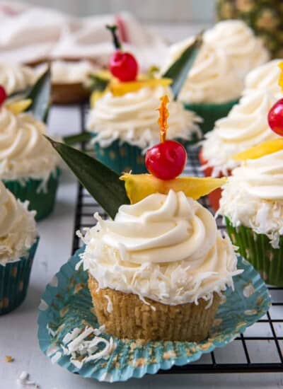 Pina Colada Cupcake with the wrapper peeled back