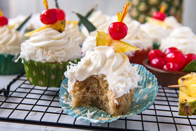 Pina Colada Cupcake with a bite removed