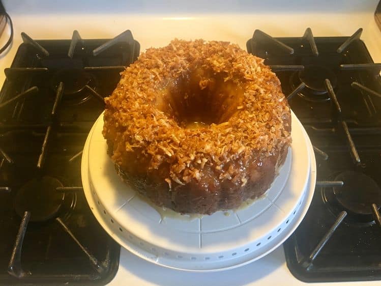 rum cake on a cake stand