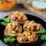 Bayou Seafood Bruschetta | A savory twist on a favorite party snack, this Bayou-inspired seafood bruschetta will leave your guests reaching for seconds and thirds!
