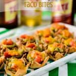 Tequila Lime Carnitas Taco Bites | Slow-cooked pork, infused with tequila, lime, and spices, then stuffed in to a two bite taco shell. A great snack for the big game!