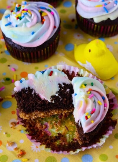 PEEPS® Surprise S'mores Cupcakes | These sweet little chocolate & graham cracker cupcakes contain a secret surprise - they're filled & iced with PEEPS®!