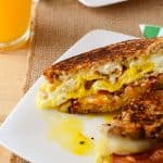 Havarti Breakfast Grilled Cheese Sandwich | A totally perfect, simple breakfast grilled cheese sandwich, made with crispy bacon, fried eggs, and two kinds of Havarti cheese!