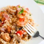 Mushroom Caprese Risotto with Balsamic Shrimp | A traditional side dish is the star of the dinner table in this simple meal, bringing together the classic flavors of caprese, prosciutto, and shrimp in a creamy, white wine risotto.