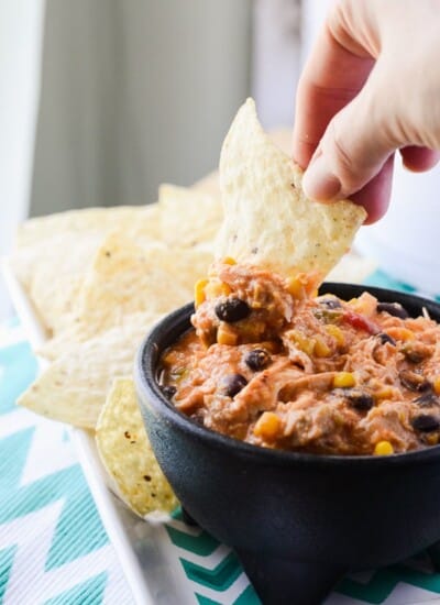 Crockpot Chicken Chili Dip | Dinner served up as an easy appetizer - this chicken chili dip is a scaled down version of the main course, cooked in the crockpot with only 5 ingredients!