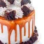 Dulce de Leche Brownie Ice Cream Cake | A cake straight out of heaven! Moist, fudgy brownie, layered with smooth & creamy dulce de leche ice cream, and topped with caramel mocha whipped cream!