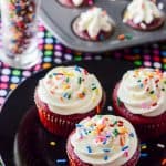 Red Velvet Cupcakes with Whipped Cream Cheese Icing | Literally the best Red Velvet Cupcake recipe in the entire world! Moist and flavorful, you can actually taste the chocolate & vanilla notes in the classic buttermilk batter.