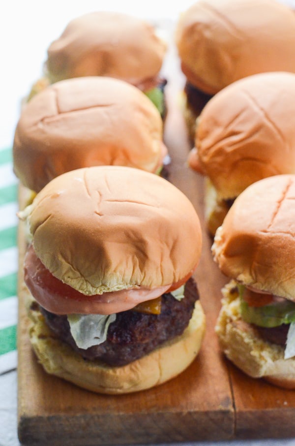 Bacon Bleu Cheese Sliders | One of the best things to come out of Mr. Crumby's Kitchen - Four-bite burgers, packed with bacon, seasoning, and just the right amount of bleu cheese. Even the bleu haters will love them!