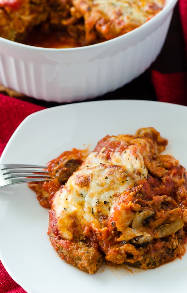 Baked Eggplant Parmesan | A healthier version of the Italian classic, this Baked Eggplant Parmesan is packed full of filling veggie goodness...and lots of glorious cheese!