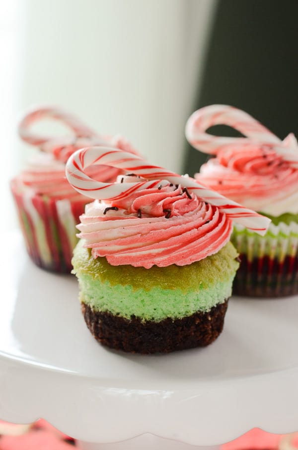 Mint Brownie Cupcakes | Two worlds collide in this quick and simple double-decker cupcake recipe - a layer of cake and brownie is topped off with a festive vanilla bean buttercream.