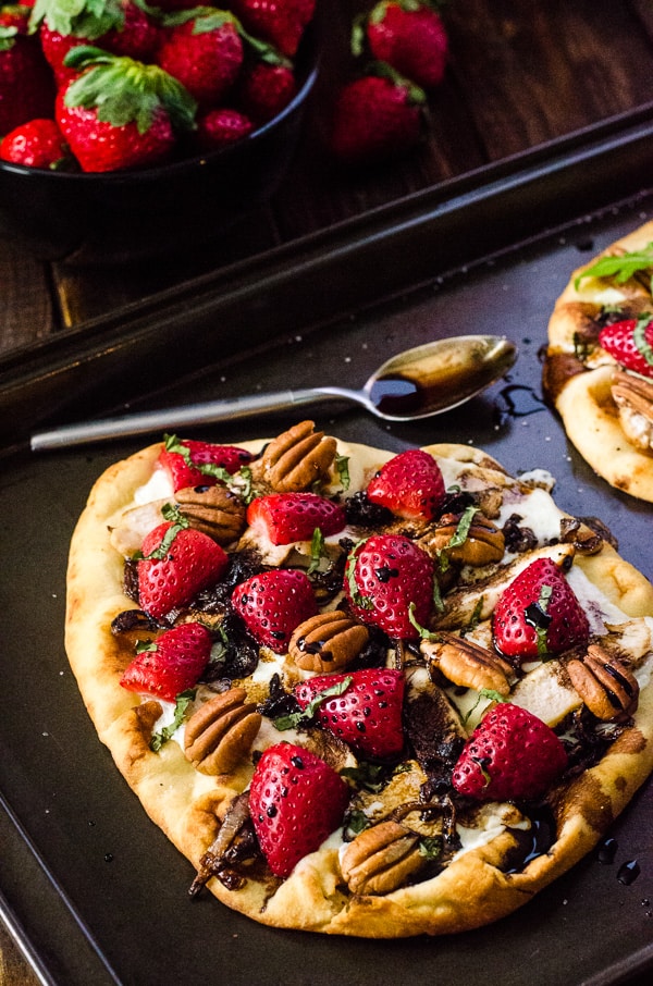 Strawberry Balsamic Chicken Flatbread | Hearty flatbread, fresh grilled chicken, toasted pecans, and a simple strawberry caprese make this recipe delicious & healthy - a favorite worth repeating in your meal plan! 