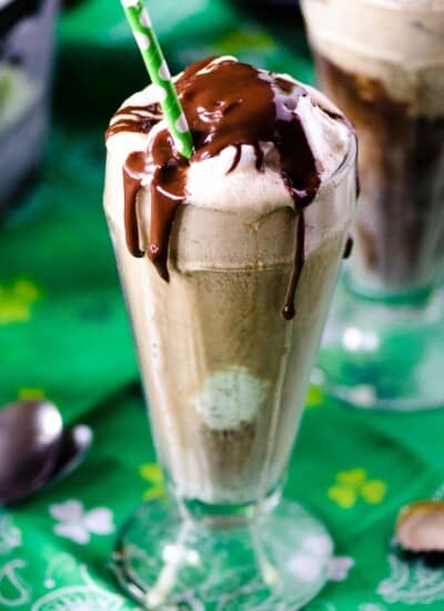 Mint Chocolate Guinness Float | Tired of the same old pint of Guinness? Kick it up Leprechaun style! Add a scoop of mint chocolate chip ice cream, a dollop of Irish cream whipped cream, and a drizzle of chocolate for a fun and festive float.Mint Chocolate Guinness Float | Tired of the same old pint of Guinness? Kick it up Leprechaun style! Add a scoop of mint chocolate chip ice cream, a dollop of Irish cream whipped cream, and a drizzle of chocolate for a fun and festive float.