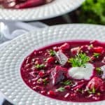 Roasted Vegetable Borscht | A traditional sweet and sour Ukrainian beet soup, enhanced with roasted vegetables, caramelized onions and leeks, all wrapped up in a brightly-colored broth - incredibly healthy and tasty to boot!
