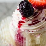 Vanilla Red Wine Berry Cupcakes | Fluffy vanilla bean cupcakes overflowing with a Pinot Noir berry filling, and topped with a berry Italian meringue buttercream - a perfect spring dessert!