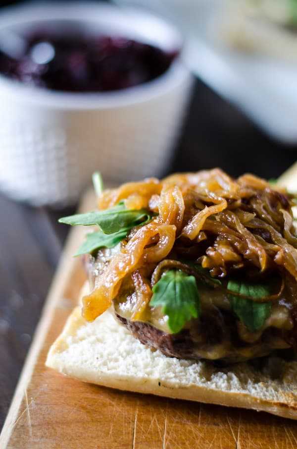 Get fancy with your grillin' and sink your teeth into a Cherry Cabernet Burger! Bacon and Cabernet-infused beef patties, topped with melty Gouda, peppery arugula, caramelized onions, and a roasted balsamic cherry & poblano chutney. 