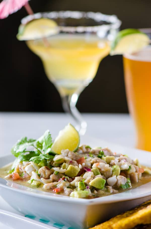 Margarita Ceviche | A Spanish tapas dish almost as good as the cocktails! Chopped calamari, ahi tuna, scallops, and shrimp, combined with fresh vegetables, lots of lime juice and a dash of tequila!