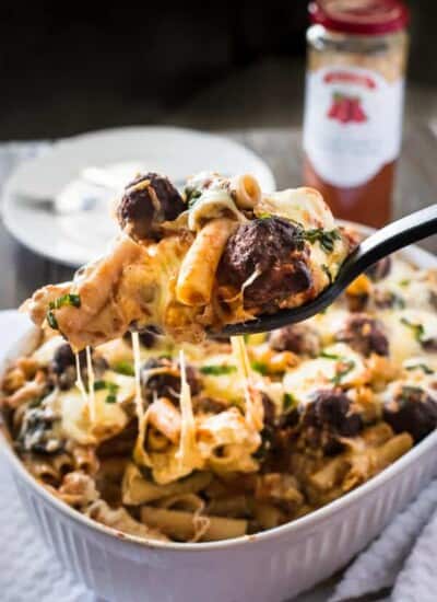 Grab a fork and dig into this Baked Ziti with Meatballs, a veggie-packed, cheese lover's heaven on a plate! The meatballs and garlic-basil marinara sauce amp up the flavors and make this a recipe you'll want every week!