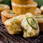 Kick up your cornbread game! These spicy, cheesy Jalapeno Popper Cornbread Muffins are the perfect side for fried chicken, chili, or just by themselves with a drizzle of honey!