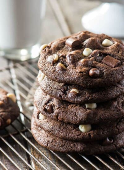 These super soft, extra chewy, totally over-sized Bakery Style Triple Chocolate Chip Cookies are about to become the new best friend to your next glass of milk!