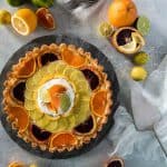 When one pie flavor just won't do - you combine three! This Triple Citrus Macaroon Mascarpone Tart is the perfect blend of sweet & tart, dense & fluffy, and is nestled in a (surprise!) coconut macaroon shell.