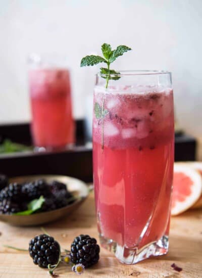 The Blackberry Paloma is a berry delicious take on an already twisted cocktail! Muddle grapefruit juice and blackberries together with a little tequila, mint, and sugar, and you've got yourself a lovely version of the popular Mexican drink.