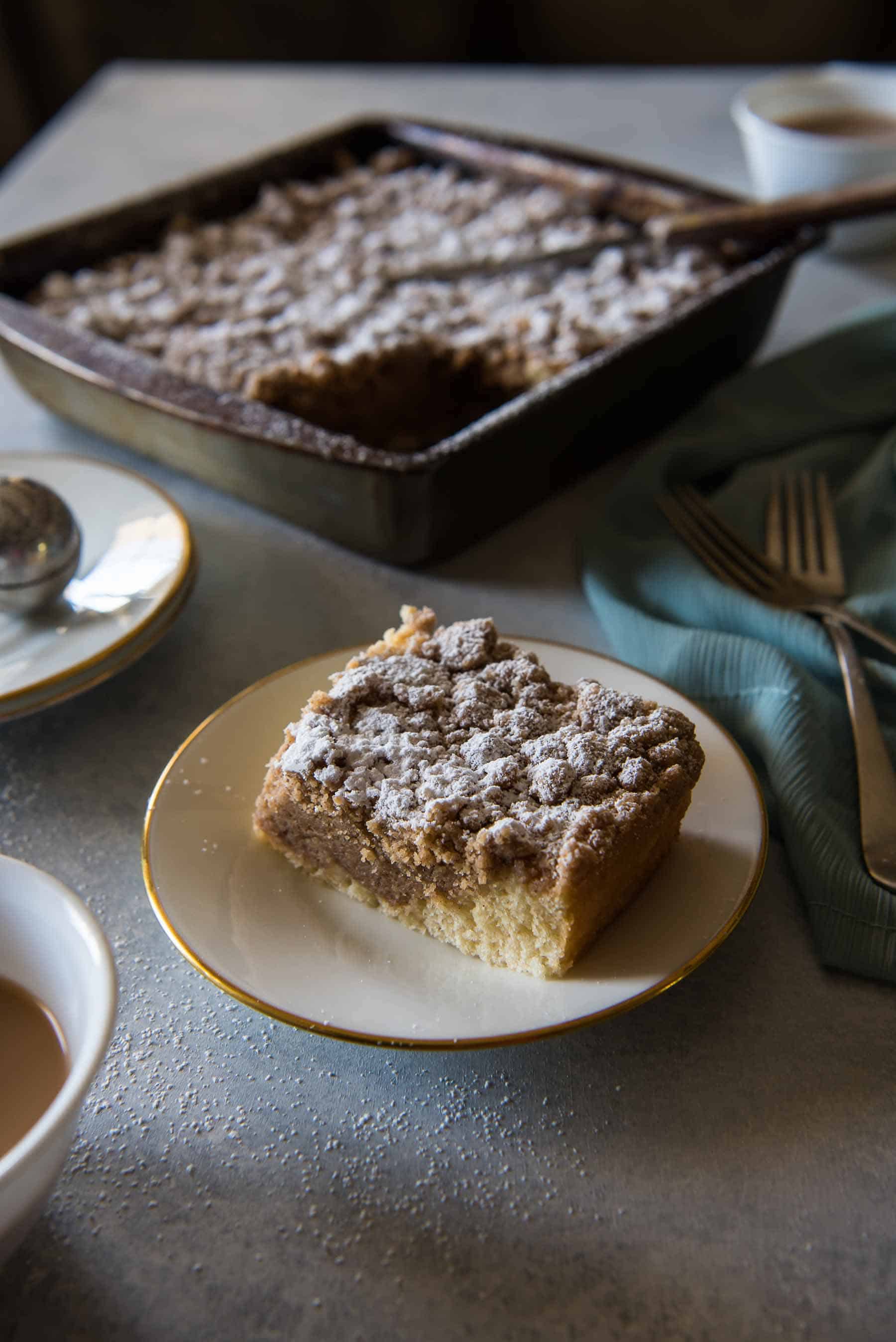 plates of crumb cake and a fork