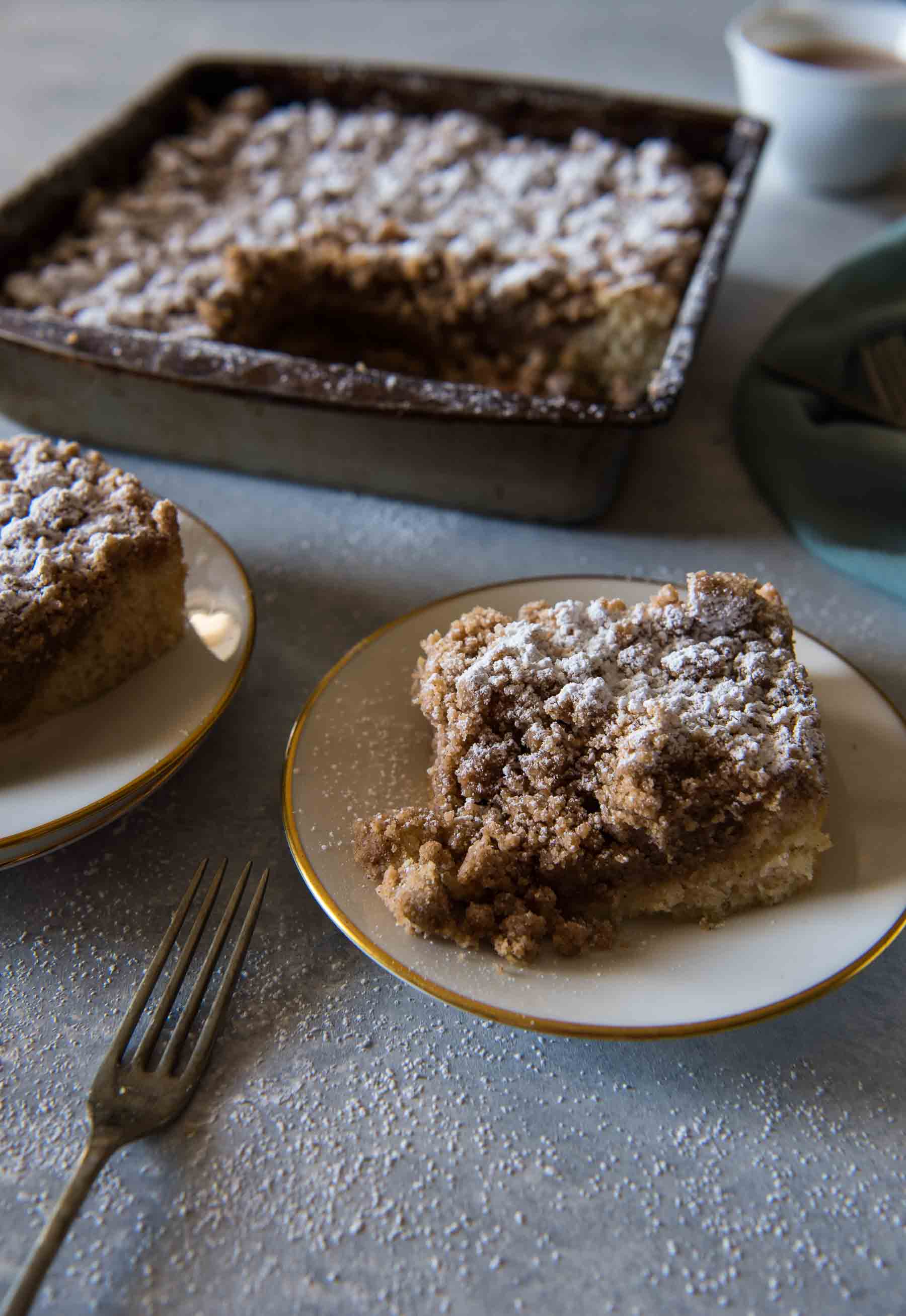 plates of new york crumb cake and a fork